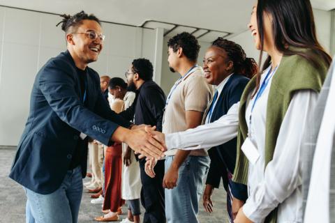 A business professional shakes hands