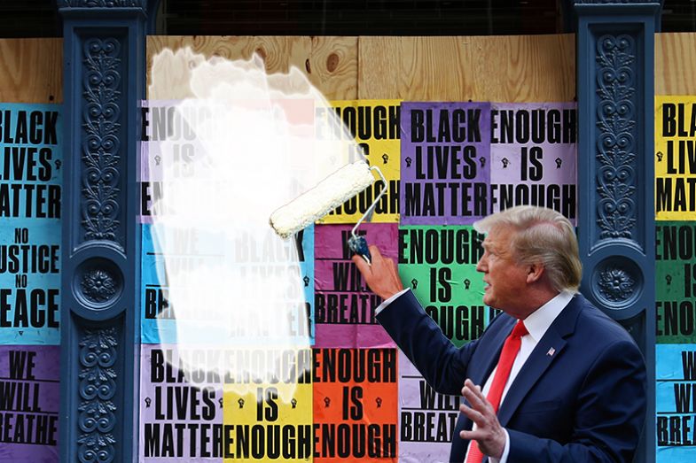 Donald Trump painting over Black Lives Matter posters. To illustrate the president’s attack on identity politics. Donald Trump painting over Black Lives Matter posters. To illustrate the president’s attack on identity politics.